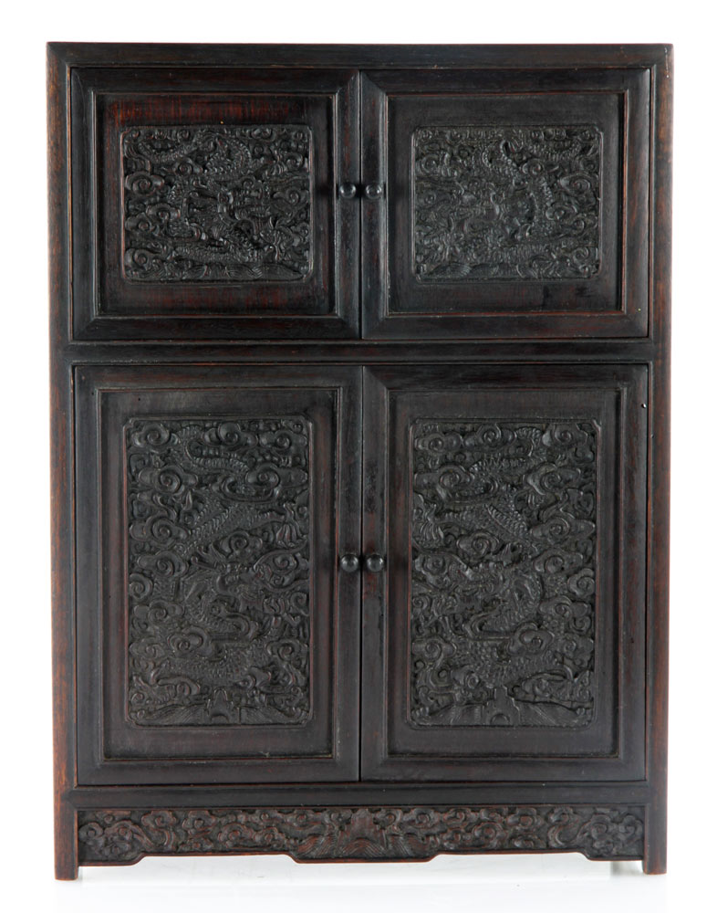 Appraisal: - Chinese Carved Dragon Hardwood Diminutive Cabinet Diminutive cabinet with