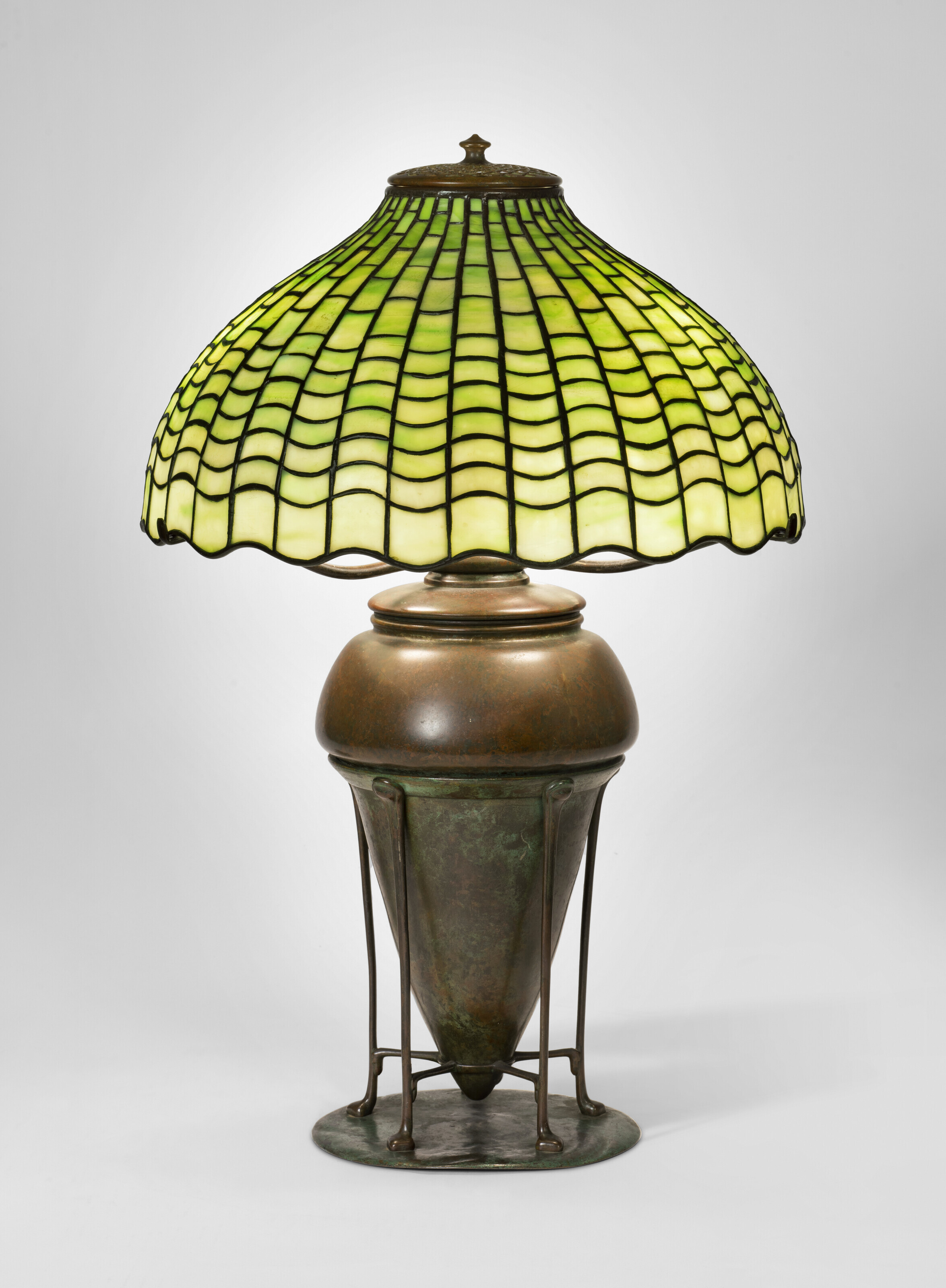 Appraisal: TIFFANY STUDIOS 'Geometric' Table Lamp circa with a 'Spun Torpedo