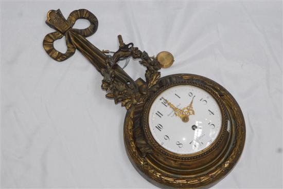 Appraisal: CARTEL CLOCK An antique french bronze wall clock with ribbon