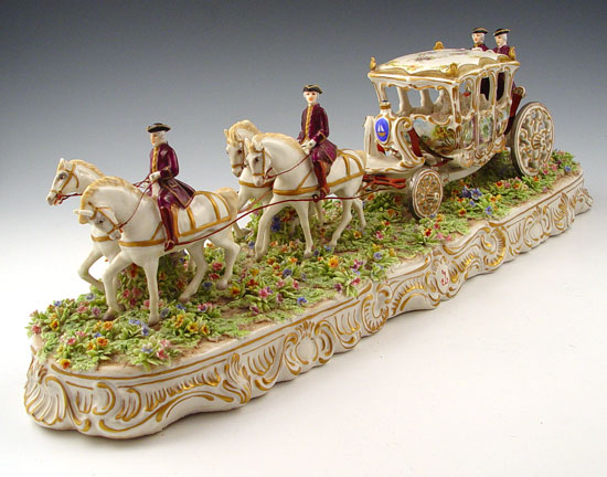 Appraisal: FABRIS ITALIAN PORCELAIN CARRIAGE WITH HORSES AND COACHMEN Highly detailed