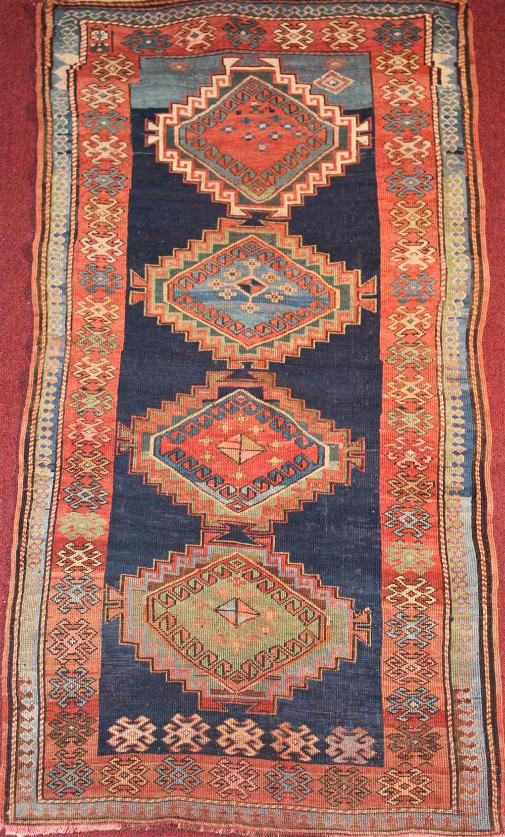 Appraisal: RUSSIAN KAZAK RUG approx ' x ' '' retail tag