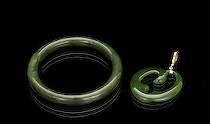 Appraisal: Nephrite Jade Carved Bracelet and K Gold and Jade Pendant