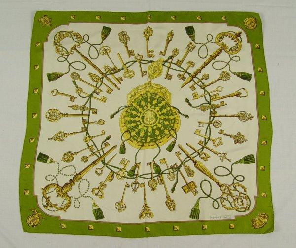 Appraisal: HERMES SILK SCARF Brass key and tassel motif '' x