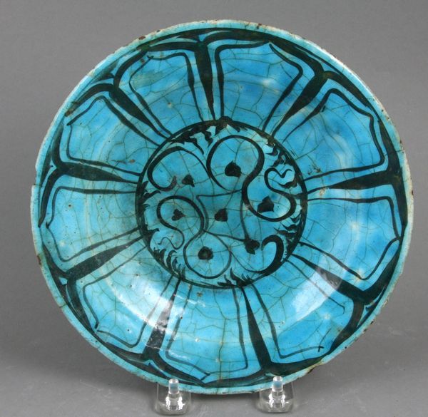 Appraisal: th th Century Persian blue glazed small plate dia paper