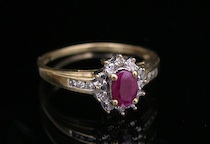 Appraisal: A Ladies' Gold Diamond Ruby Ring k yellow gold ring