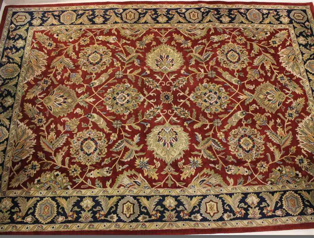 Appraisal: DALYN WOOL INDO-PERSIAN ''JEWEL'' DESIGN RUG machine made in reds