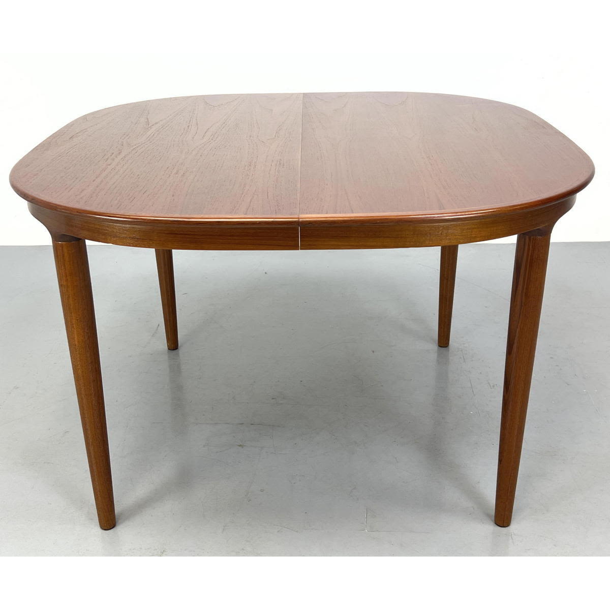 Appraisal: Danish teak dining table with rounded corners No leaf Refinished