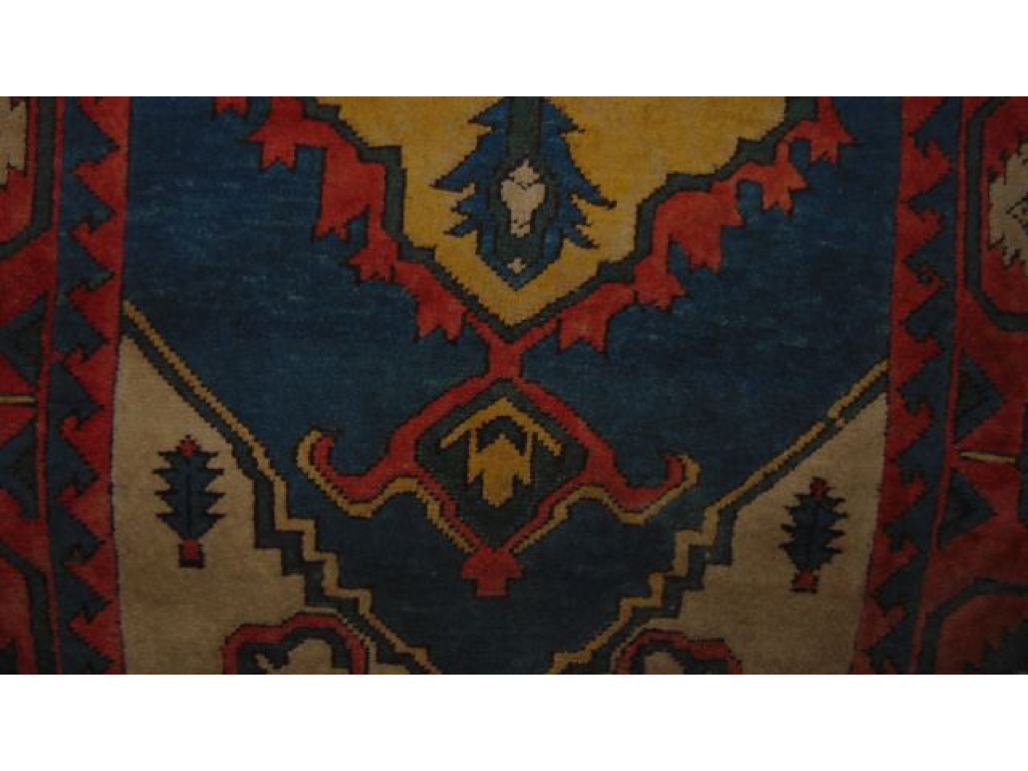 Appraisal: A Turkey wool rug with blue panel upon a white