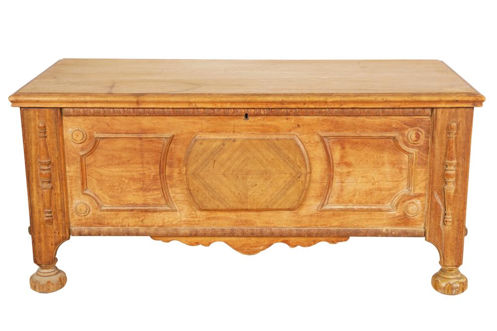 Appraisal: CARVED FRUITWOOD BLANKET CHESTwith hinged lid enclosing an open cedar-lined