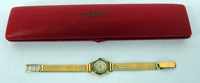 Appraisal: AN EIGHTEEN CARAT GOLD LADIES BAUME MERCIER WRISTWATCH silver dial