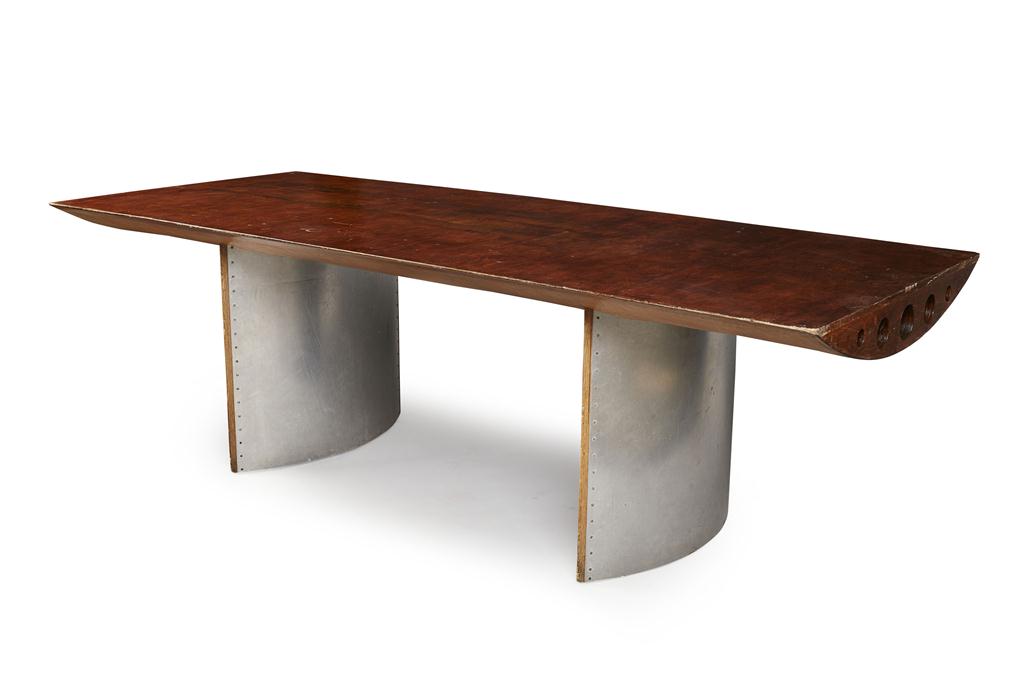 Appraisal: PLYWOOD AND STEEL DINING TABLE CONTEMPORARY made from airplane wings