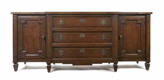 Appraisal: An American Walnut Sideboard Baker the breakfront top centered with