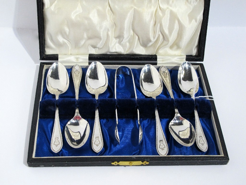 Appraisal: A cased set of six silver spoons with tongs Sheffield