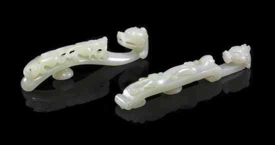 Appraisal: Two Chinese Carved Jade Belt Hooks of pale celadon white