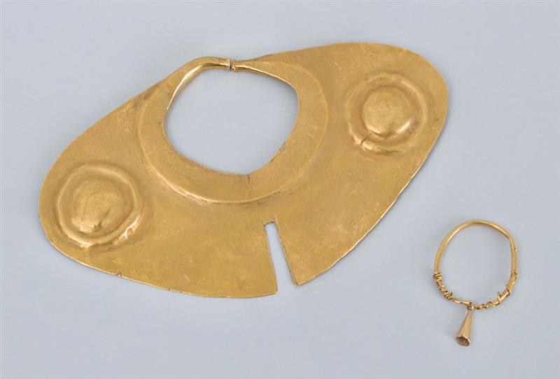 Appraisal: LARGE K GOLD TRIBAL NOSE RING Together with a smaller