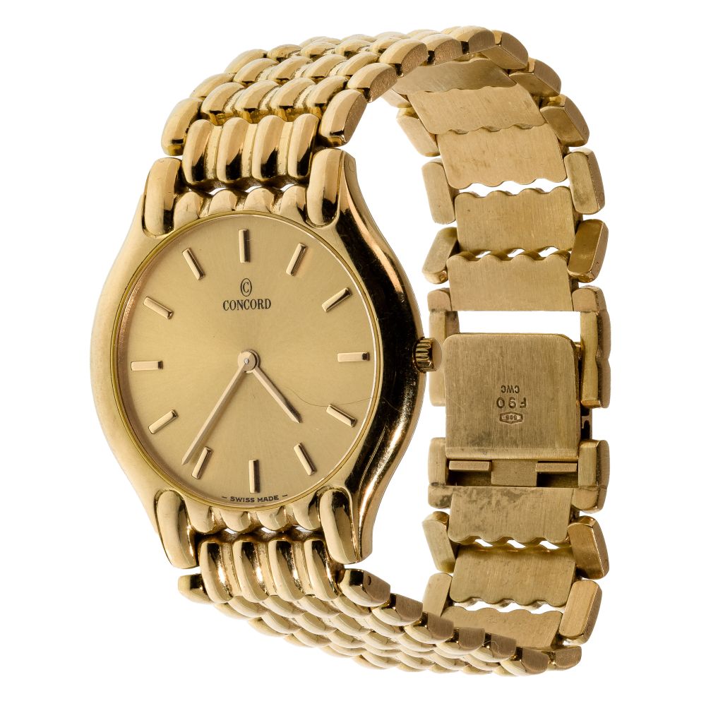 Appraisal: CONCORD K YELLOW GOLD CASE AND BAND WRISTWATCHSerial round face