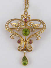 Appraisal: A fine Art Nouveau carat gold peridot garnet amethyst and