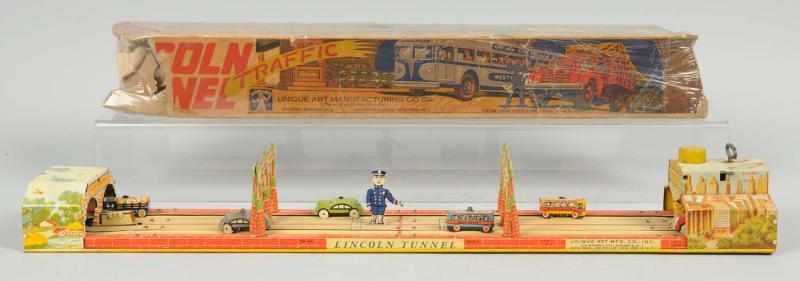 Appraisal: Tin Litho Unique Art Lincoln Tunnel Wind-Up Toy American Working