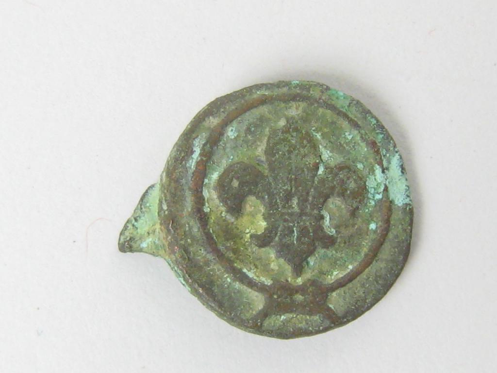 Appraisal: A Bezel from a medieval bronze ring decorated with a