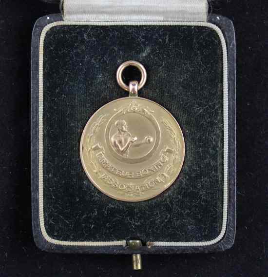 Appraisal: A cased Amateur Boxing Association ct gold medallion decorated with