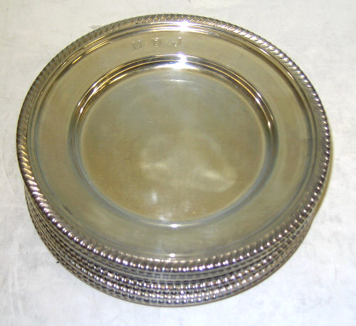 Appraisal: TWELVE GORHAM SILVER BREAD BUTTER PLATES gadroon rims monogrammed Diameter