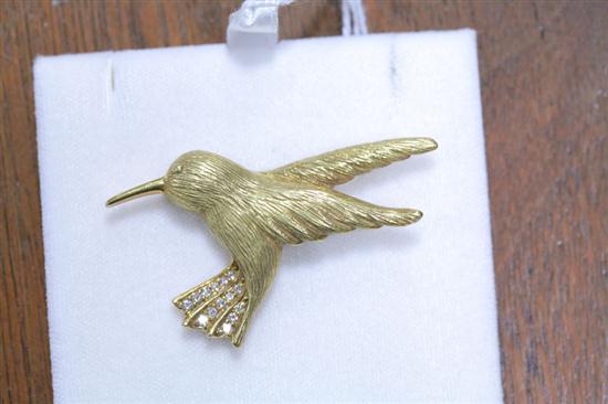 Appraisal: HUMMINGBIRD BROOCH K yellow gold with fourteen full cut prong