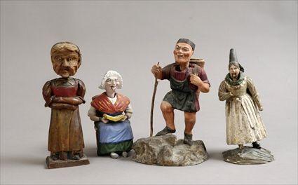 Appraisal: Four Papier-M ch and Carved Wood Bobbing-Head Figures to in