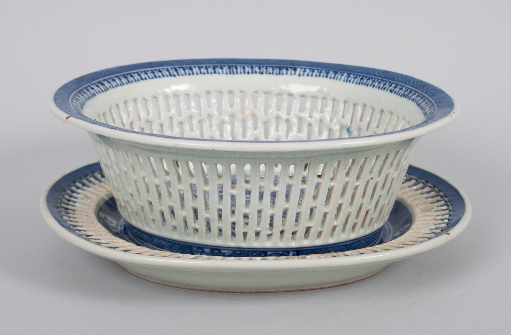 Appraisal: Chinese Export porcelain chestnut basket late th century reticulated blue