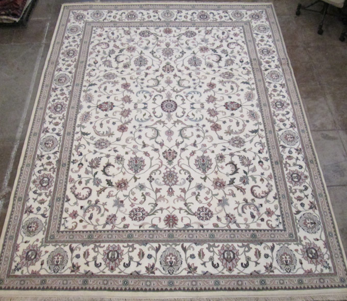 Appraisal: HAND KNOTTED ORIENTAL CARPET Indo-Persian overall Isfahan floral design on