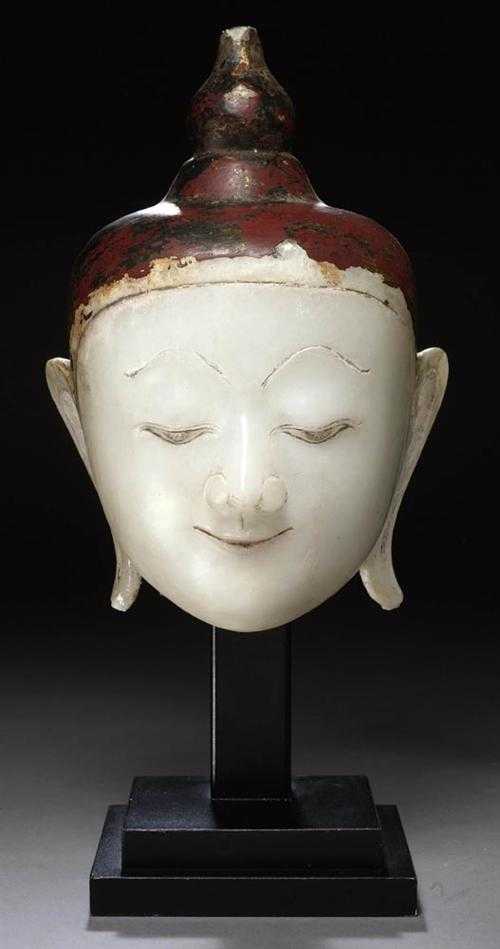 Appraisal: BUDDHA HEAD Burma th century H cm Alabaster with remains