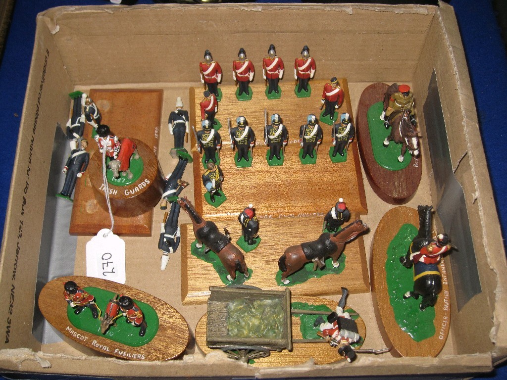 Appraisal: Lot comprising assorted model soldiers on wooden mounts