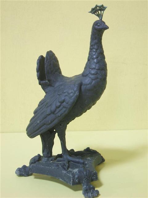 Appraisal: ENGLISH LEAD FIGURE OF A PEACOCK th century above a