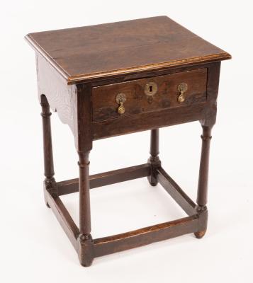 Appraisal: An th Century oak side table fitted with a single