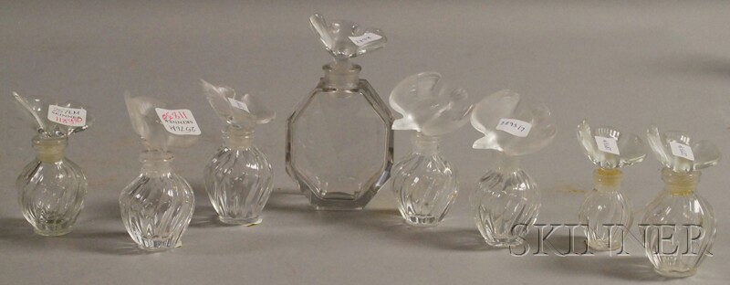 Appraisal: Seven Lalique Nina Ricci Perfume Glass Bottles and a Baccarat