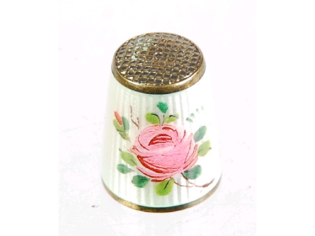 Appraisal: NORWEGIAN SILVER AND ENAMELLED THIMBLE decorated with pink roses on