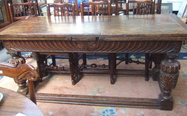 Appraisal: A th century and later oak draw leaf table the