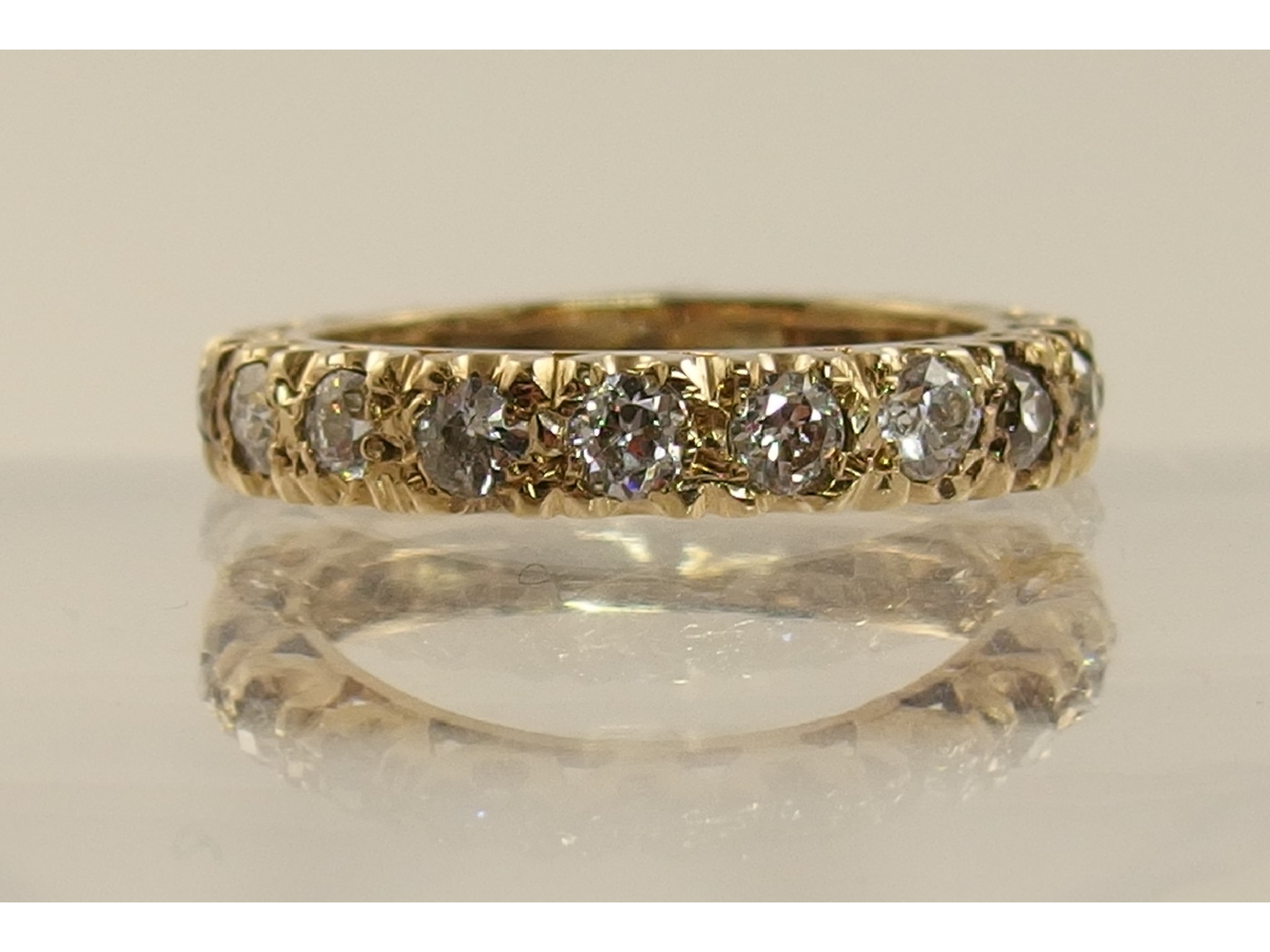 Appraisal: A yellow metal diamond eternity ring approx diamond weight cts