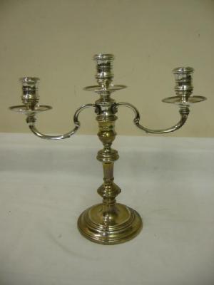 Appraisal: A CANDELABRUM in the Georgian style with three waisted sconces