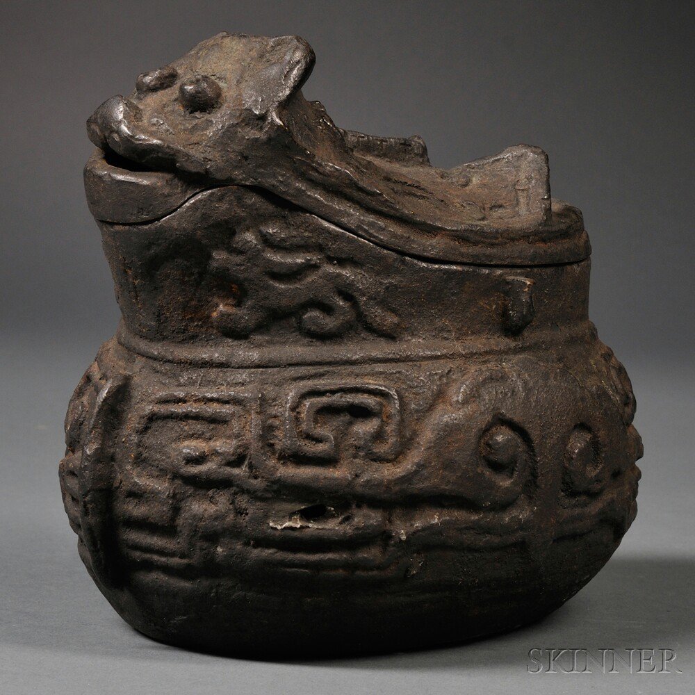 Appraisal: Archaic-style Bronze Covered Vessel China with an animal head-shaped cover