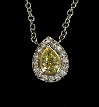 Appraisal: Ladies' Fancy Yellow Diamond Pendant k white gold chain necklace