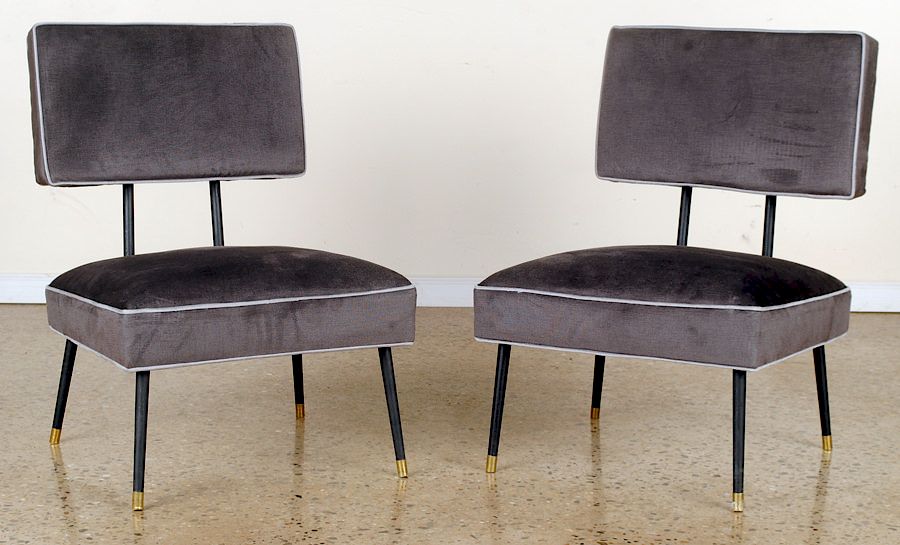 Appraisal: PAIR IRON UPHOLSTERED CLUB CHAIRS MANNER DUNBAR A pair of