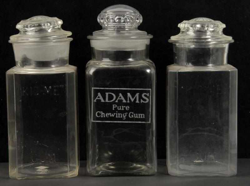 Appraisal: Lot of Glass Gum Jars Description Includes two Kis-Me and