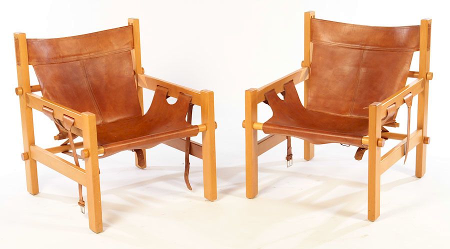 Appraisal: PAIR CAMPAIGN STYLE ARM CHAIRS LEATHER BACKS A pair of