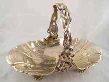 Appraisal: A Continental silver Art Nouveau cake basket on rococo shell