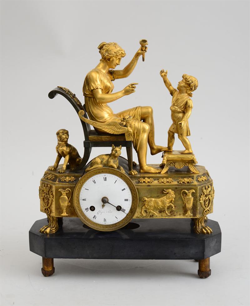 Appraisal: EMPIRE GILT-BRONZE BRONZE AND BLACK MARBLE FIGURAL MANTLE CLOCK The