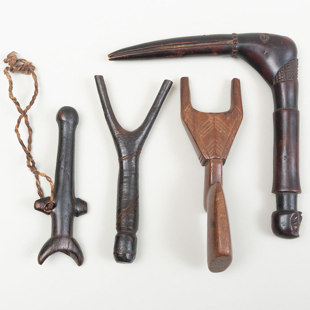 Appraisal: Group of Four African Wooden Articles including Two Figural Slingshots