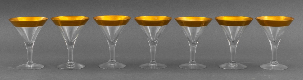 Appraisal: GOLD RIMMED HAND BLOWN MARTINI GLASSES Set of seven hand-blown