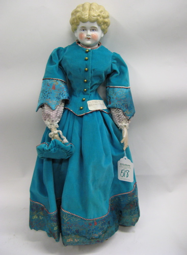 Appraisal: GERMAN CHINA HEAD DOLL Blond molded hair painted blue eyes