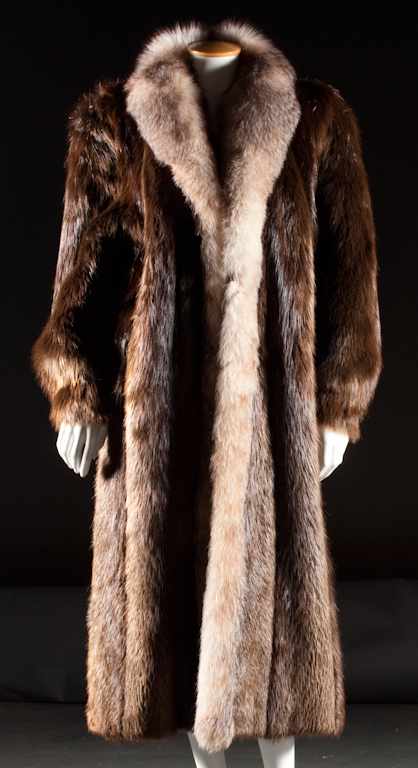 Appraisal: Lady's long fur coat with a fox fur collar Estimate