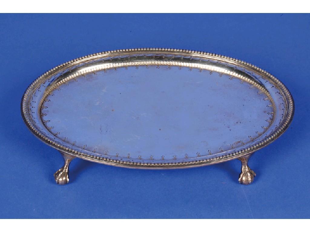 Appraisal: A VICTORIAN TEAPOT STAND of oval form with a raised